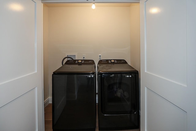 laundry room with washer and clothes dryer