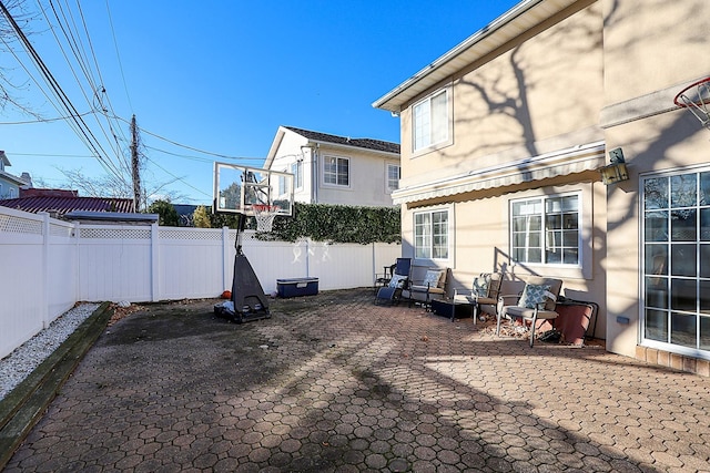 rear view of house featuring a patio