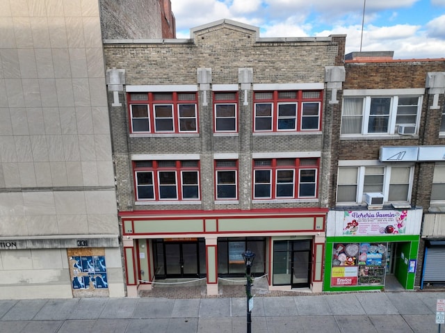 view of building exterior featuring cooling unit