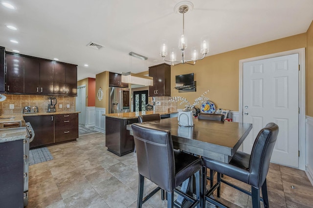 dining room with an inviting chandelier