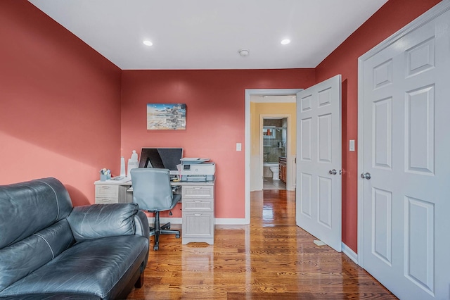 office area with hardwood / wood-style flooring