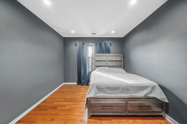 bedroom featuring light wood-type flooring