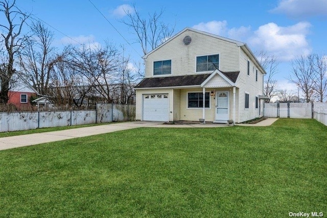 view of property with a garage and a front lawn