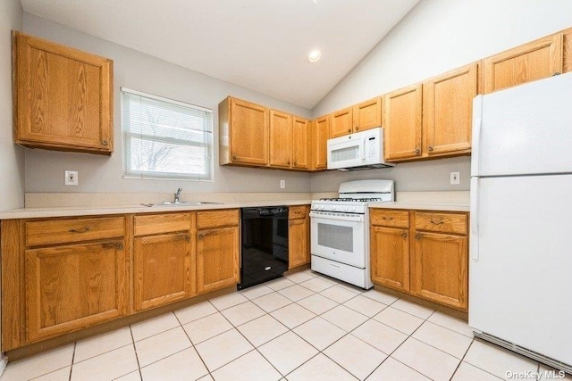 kitchen featuring lofted ceiling, sink, white appliances, and light tile patterned flooring