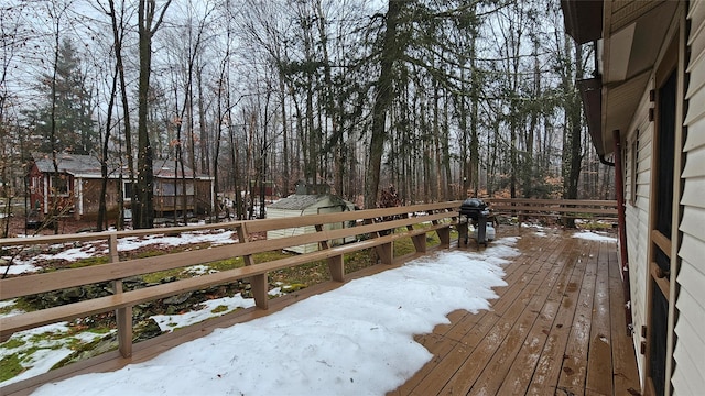 view of snow covered deck