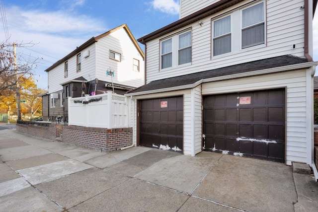 view of front of home with a garage