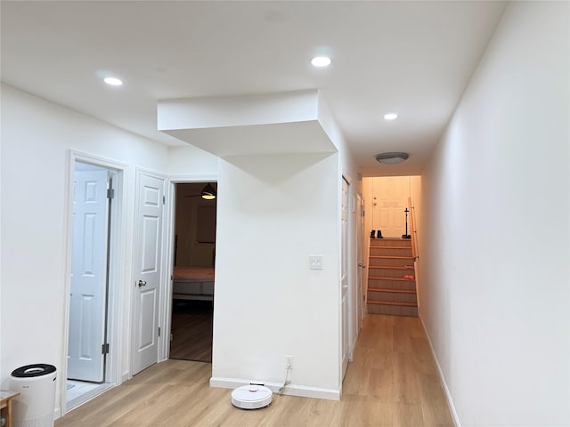 corridor featuring light hardwood / wood-style flooring