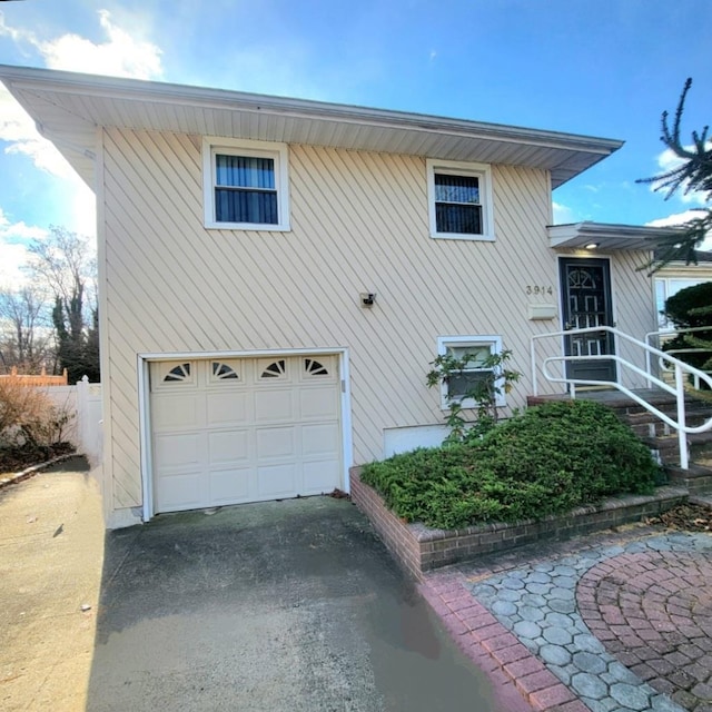 view of home's exterior with a garage