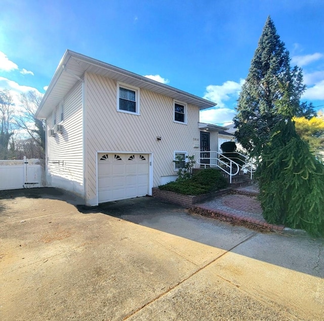 view of home's exterior with a garage