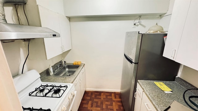 kitchen with white cabinetry, white gas range, sink, and exhaust hood