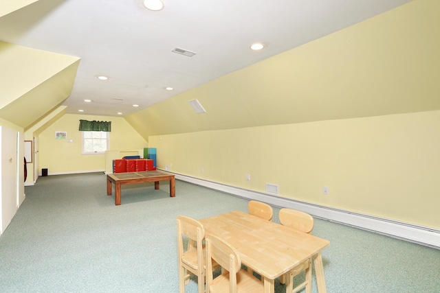 playroom with carpet floors and vaulted ceiling