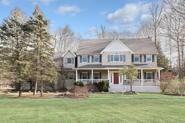 view of front facade featuring a front lawn and covered porch