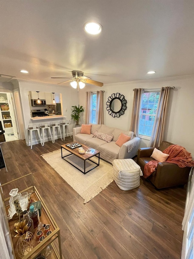 living area with ceiling fan, dark wood finished floors, and recessed lighting