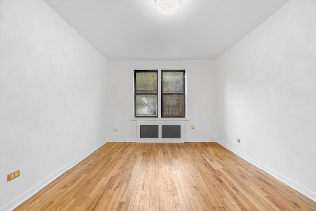 empty room featuring light hardwood / wood-style floors