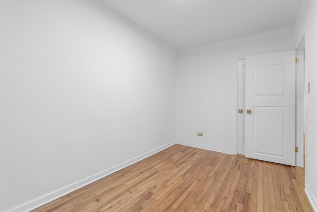 unfurnished room with light hardwood / wood-style flooring