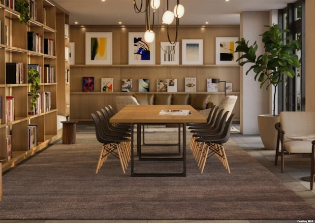 tiled dining space featuring ornamental molding