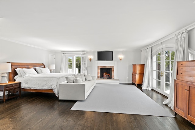 bedroom with french doors and dark hardwood / wood-style floors