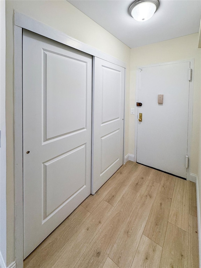 doorway to outside with light hardwood / wood-style floors