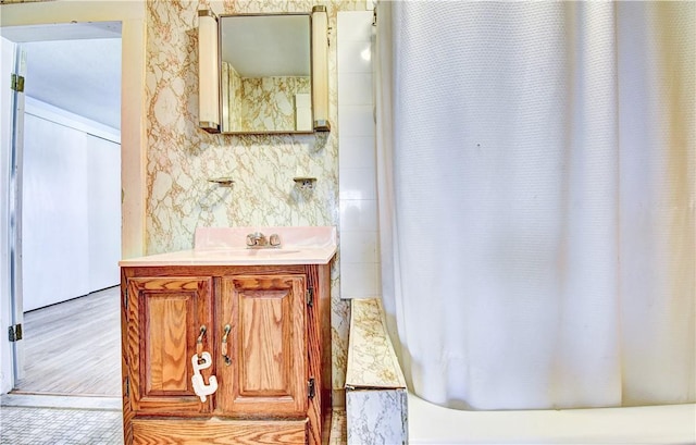 bathroom with wood-type flooring and vanity