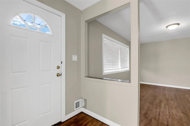 foyer entrance featuring dark hardwood / wood-style flooring