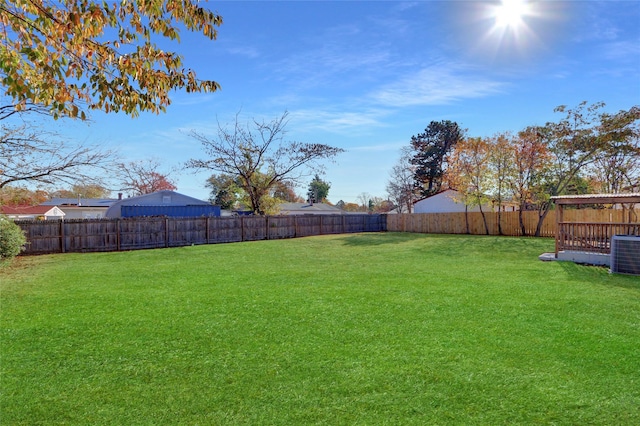 view of yard with central AC