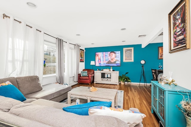 living room featuring hardwood / wood-style flooring