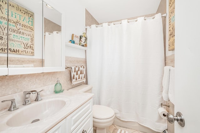 bathroom with walk in shower, tile patterned floors, toilet, decorative backsplash, and vanity