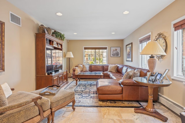 living room featuring baseboard heating