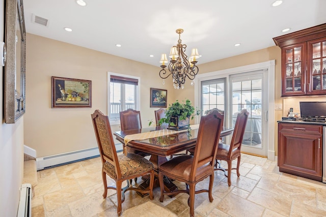 dining space with a chandelier and a baseboard radiator