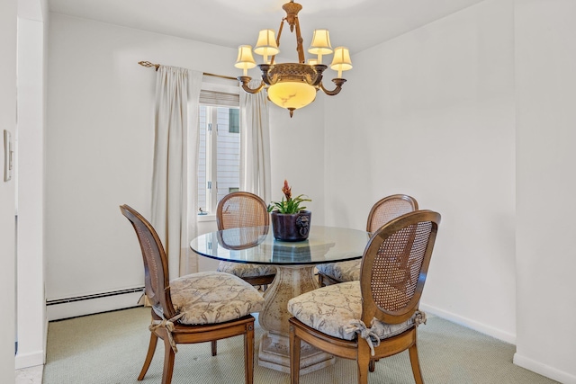 dining room with carpet flooring, a notable chandelier, and a baseboard radiator