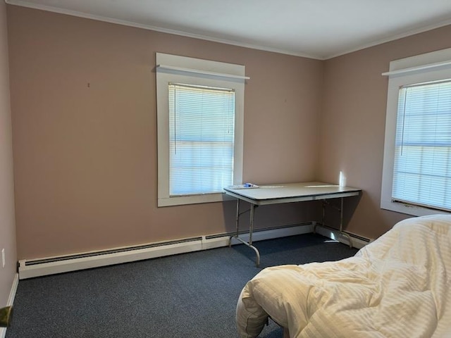 office area featuring carpet flooring, baseboard heating, and crown molding