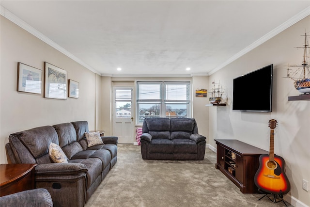 carpeted living room with crown molding