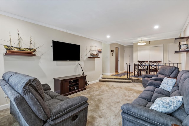 carpeted living room with ornamental molding