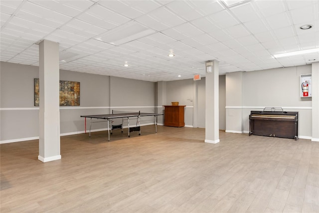 basement featuring light hardwood / wood-style flooring