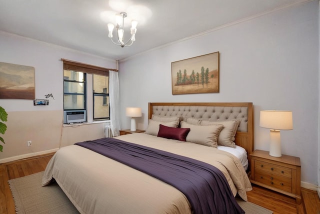 bedroom with a chandelier, hardwood / wood-style floors, cooling unit, and crown molding