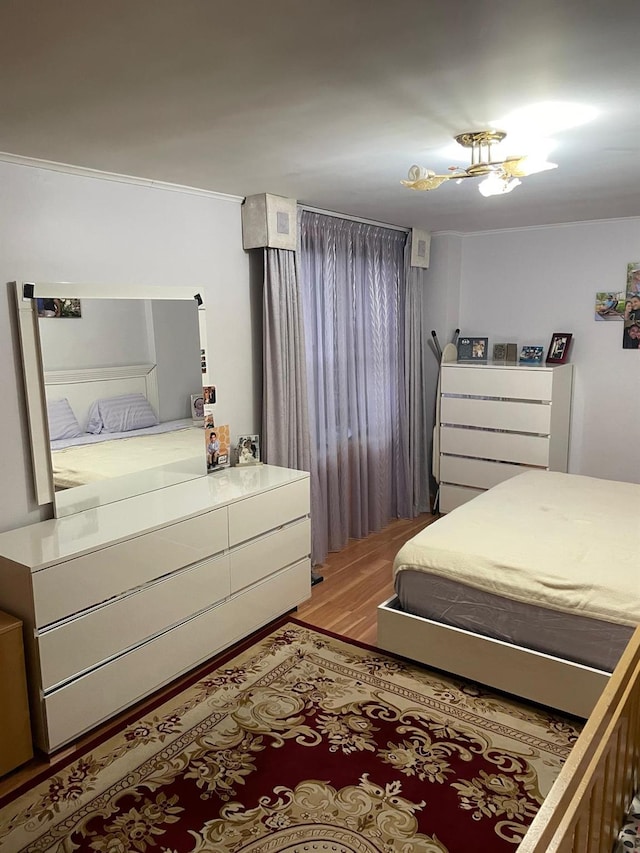 bedroom featuring hardwood / wood-style flooring