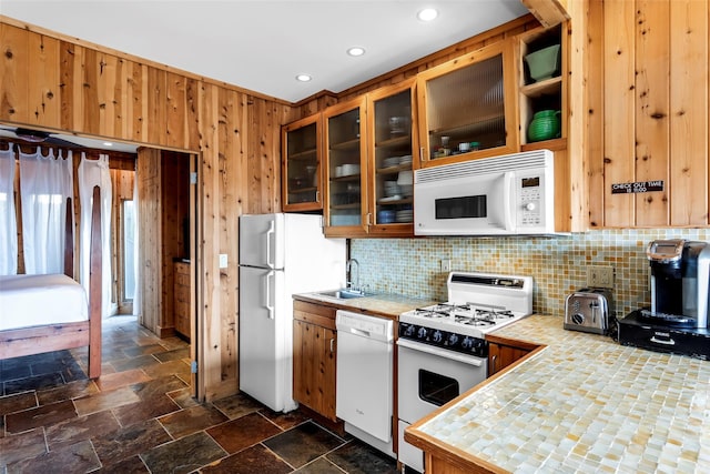 362 Ocean Walk, Fire Island Pines, NY 11782 - kitchen featuring white appliances, a sink, decorative backsplash, dark stone finish floors, and recessed lighting