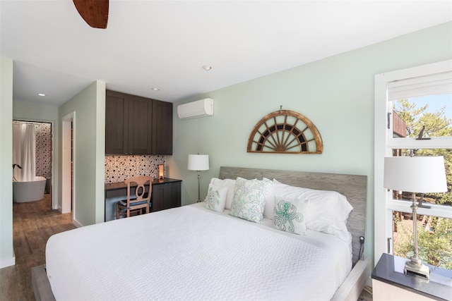 362 Ocean Walk, Fire Island Pines, NY 11782 - bedroom featuring a wall mounted air conditioner, wood finished floors, and recessed lighting