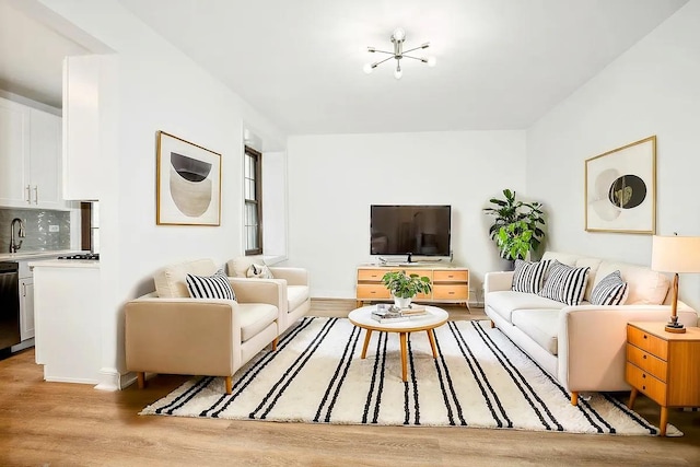 living room with light hardwood / wood-style flooring