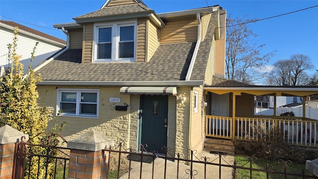 view of front of home featuring covered porch