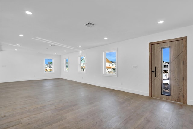 unfurnished room featuring light hardwood / wood-style flooring