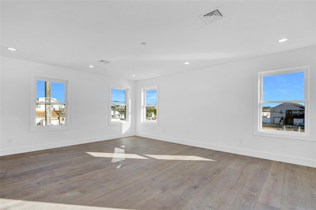 unfurnished room featuring light wood-type flooring