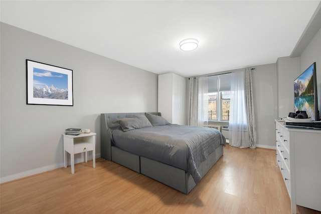 bedroom featuring light wood-type flooring