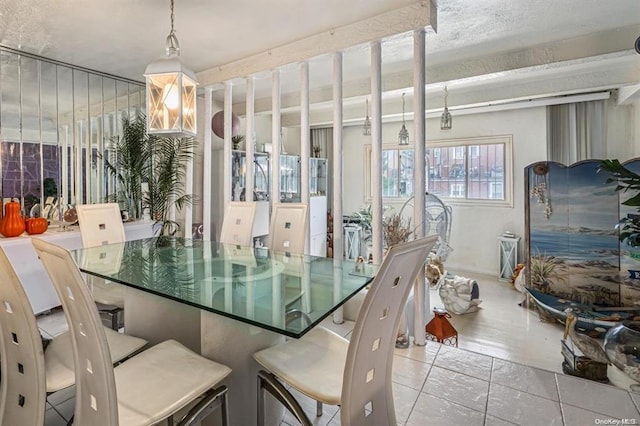 view of tiled dining space