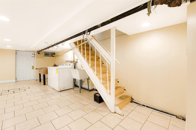 basement with washer / dryer and sink