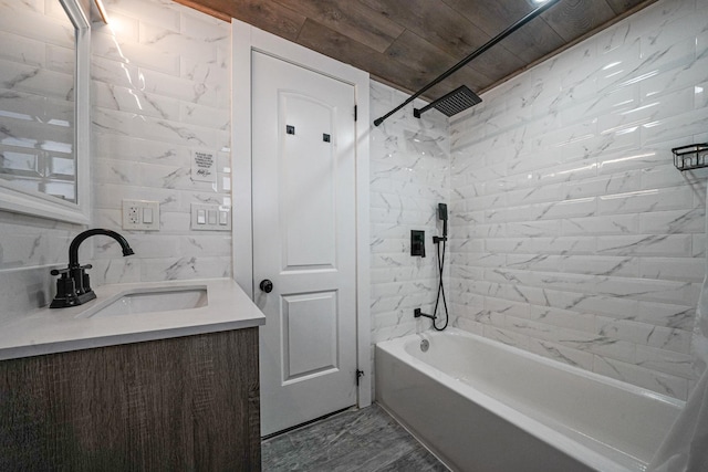 bathroom featuring decorative backsplash, vanity, tile walls, wooden ceiling, and tiled shower / bath