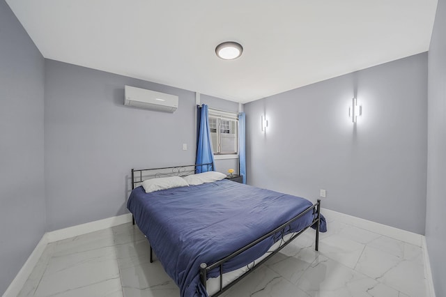 bedroom featuring an AC wall unit