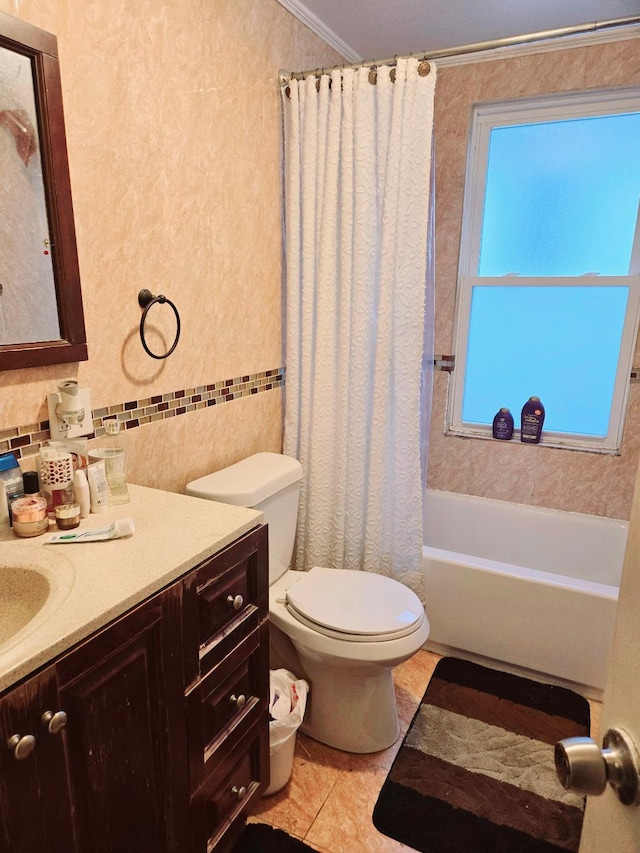 full bathroom featuring shower / bath combo, tile patterned floors, vanity, crown molding, and toilet