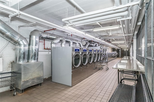 interior space featuring separate washer and dryer and tile patterned flooring