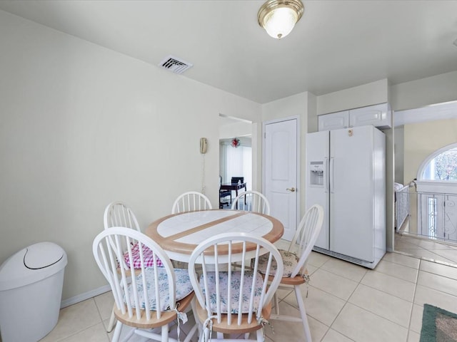 view of tiled dining space